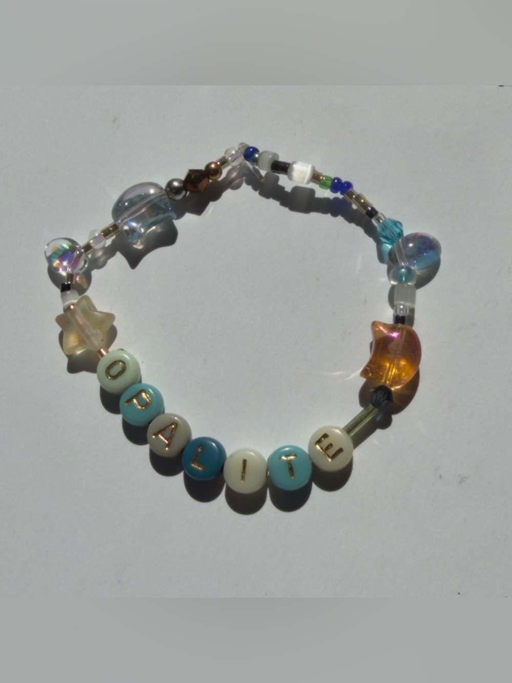 Taylor Swift (OPALITE) Blue White and Gold Beaded Bracelet
